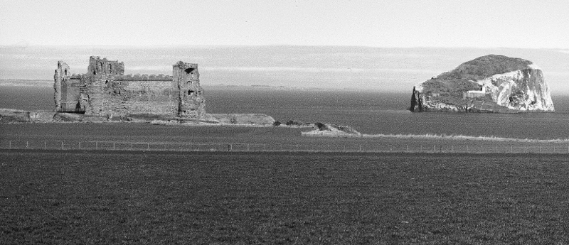 Bass Rock and Tantallon Castle, photographed from the south near Auldhame, 1989. (David Moody)