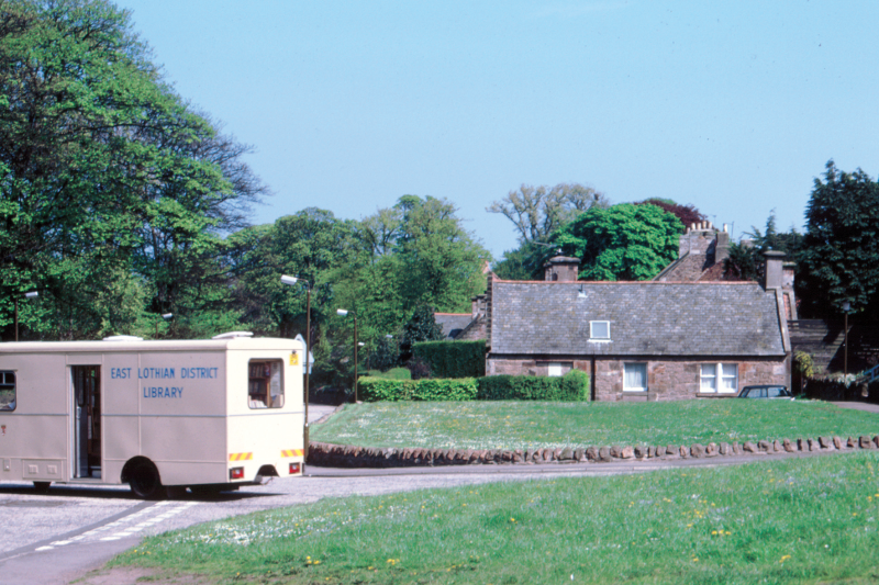 East Lothian District Library van leaving Ruthven Road, Dirleton. The cottage beyond is Woodend.