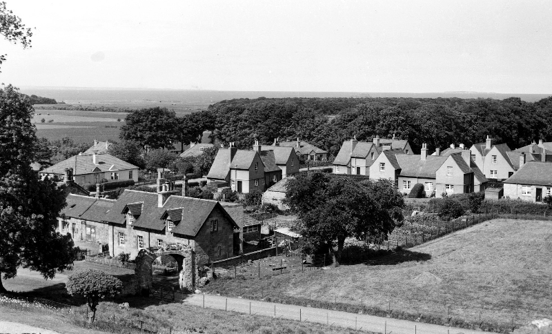 Houses in Dirleton village viewed from the castle. In the foreground are Castlemains farm cottages. Next to these is the old bakehouse which was a Co-op grocery store till the mid 1960s. (A&J Gordon)